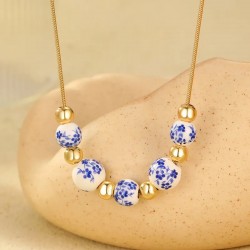 Collier perles porcelaine...